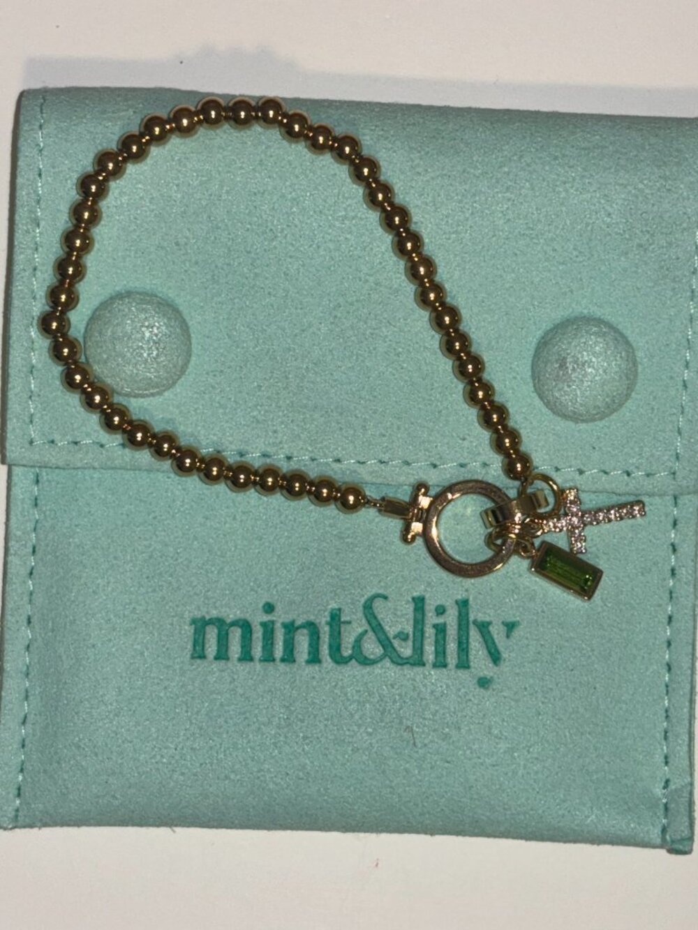 Mint & Lily Gold Beaded Stretch Bracelet Cross & Green Crystal Charm